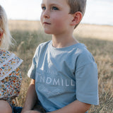 LWCC embroidered kids tee powder blue hem detail showing quality finish