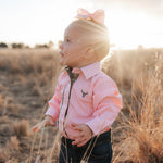 Chloe coral gingham long sleeve romper print close-up showing coral gingham check pattern