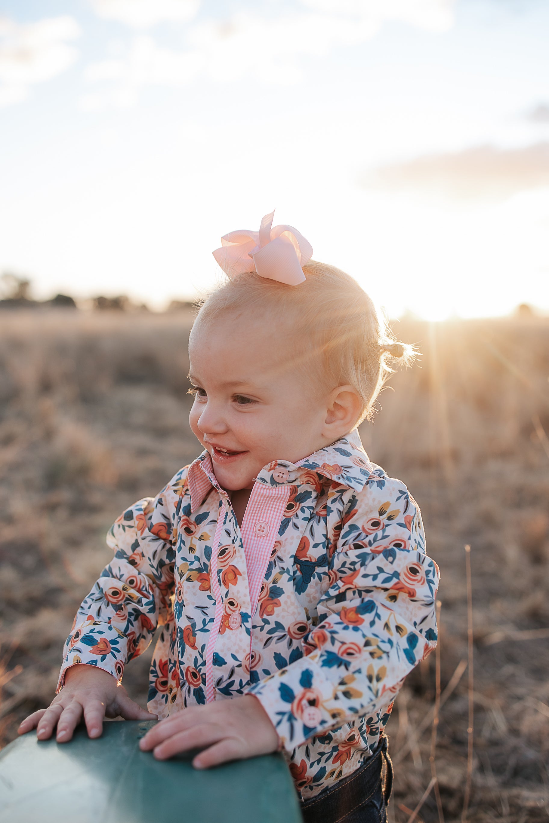 Milla floral dream long sleeve romper back view showing snap closure and beautiful floral dream print