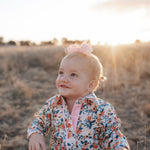 Milla floral dream long sleeve romper worn by toddler showing charming floral country style