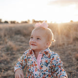 Milla floral dream long sleeve romper worn by toddler showing charming floral country style