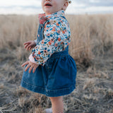 Milla floral dream long sleeve romper flatlay showing full floral dream print design