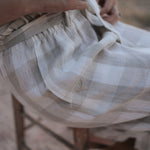 Latte Luci ladies linen pants front view showing relaxed latte beige linen wide-leg trousers