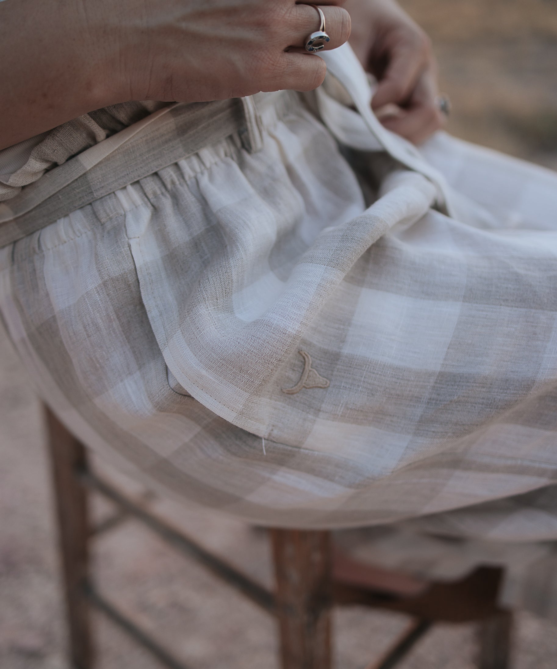 Latte Luci ladies linen pants front view showing relaxed latte beige linen wide-leg trousers