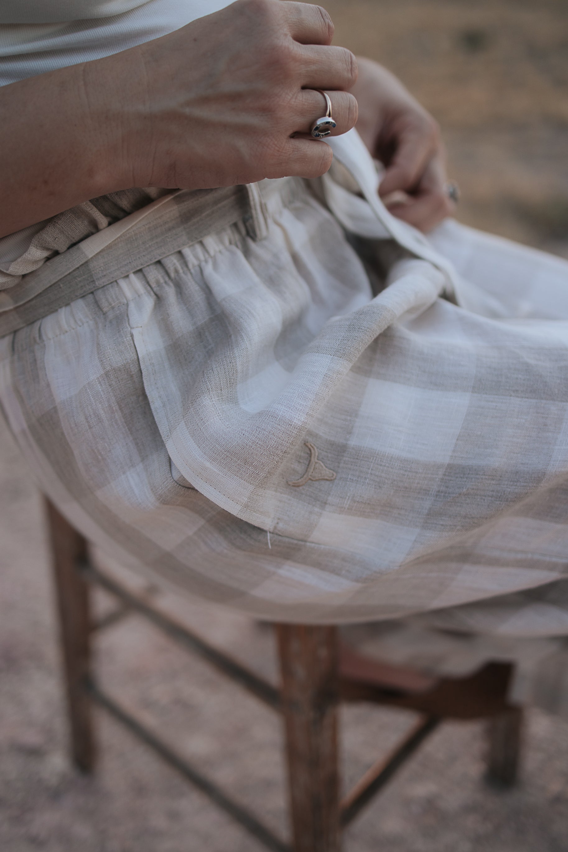 Latte Luci ladies linen pants front view showing relaxed latte beige linen wide-leg trousers