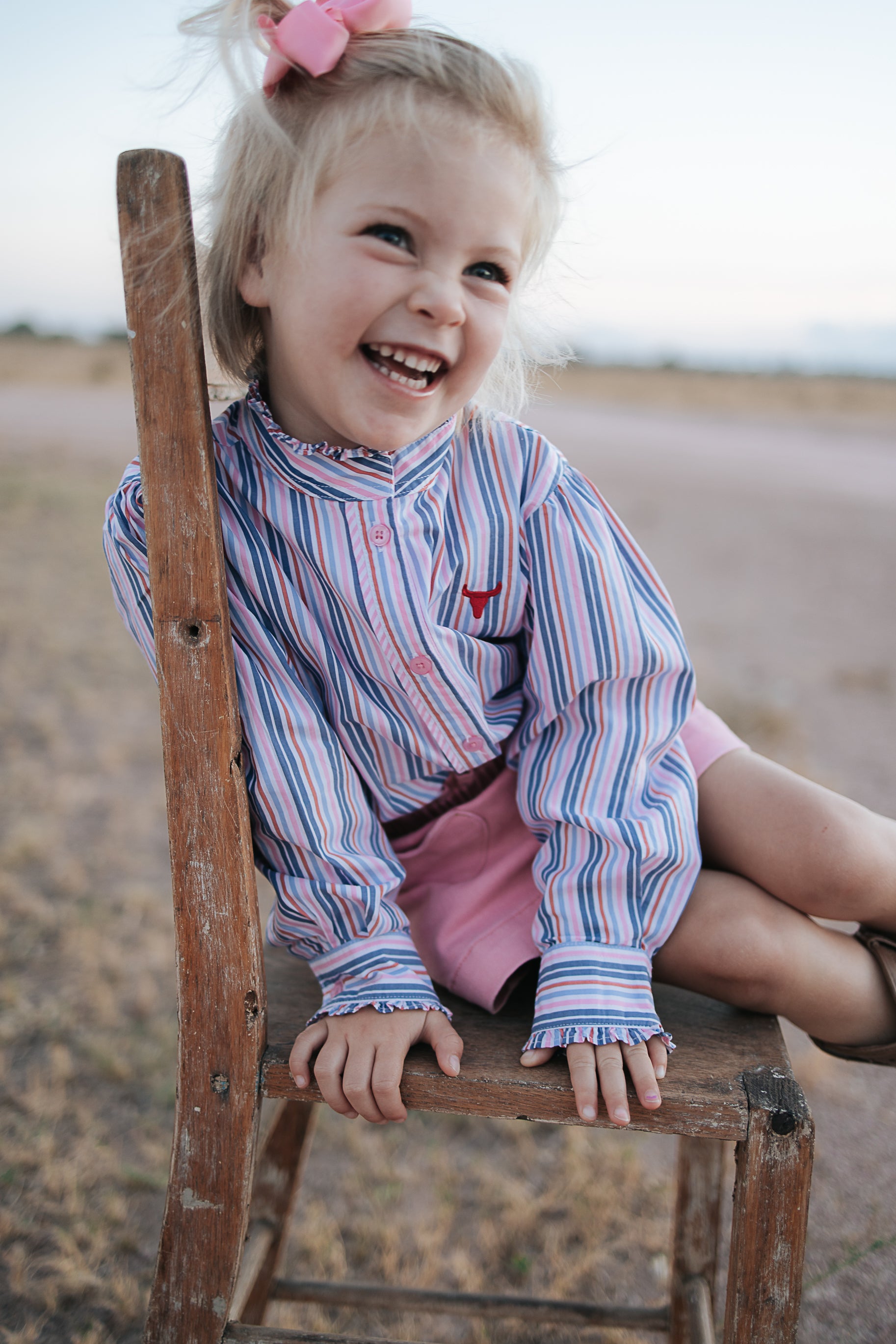 Lauren multi stripe pink ruffle long sleeve shirt ruffle detail showing beautiful front ruffle trim