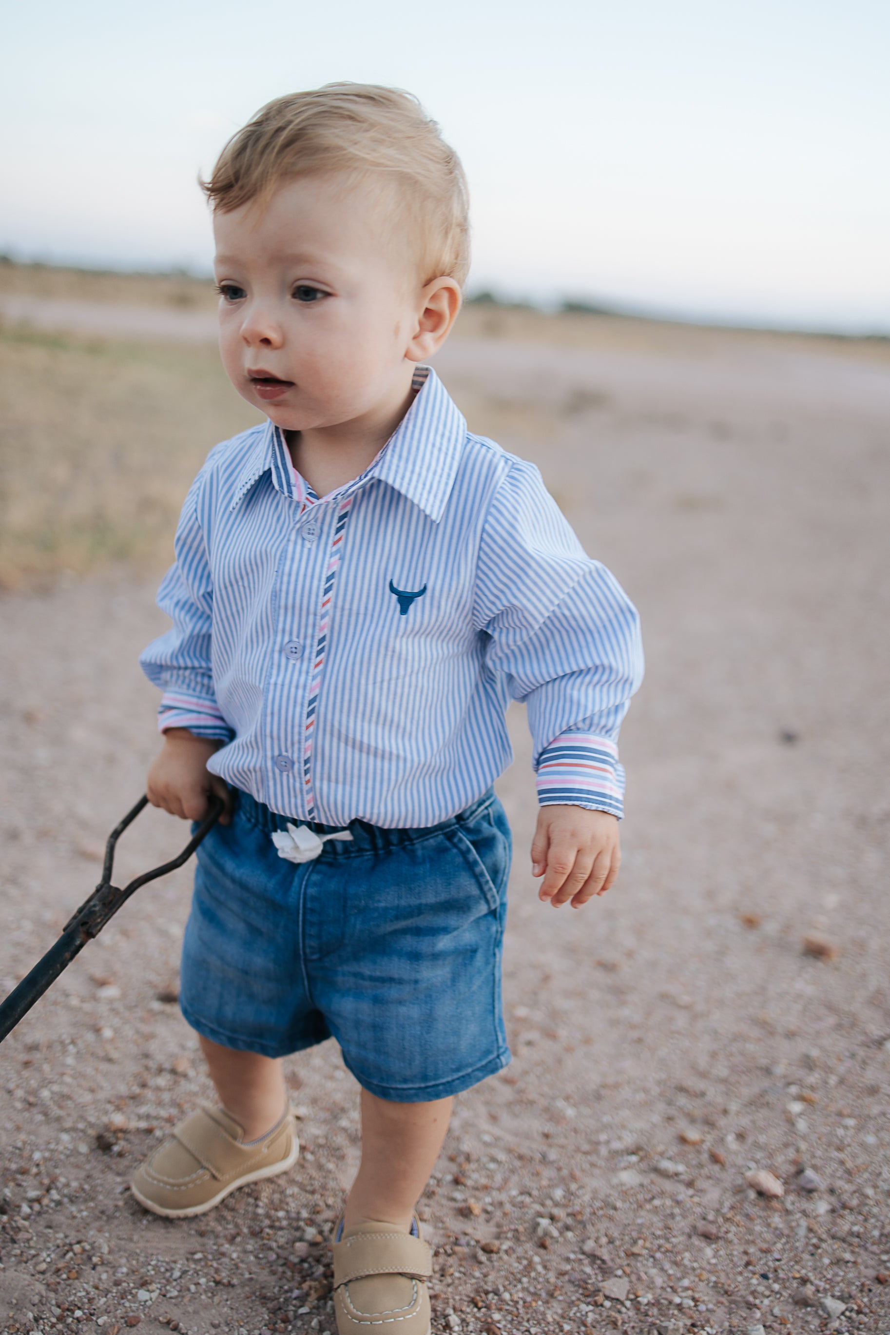 Rhett multi stripe blue long sleeve romper size detail showing available sizes for kids