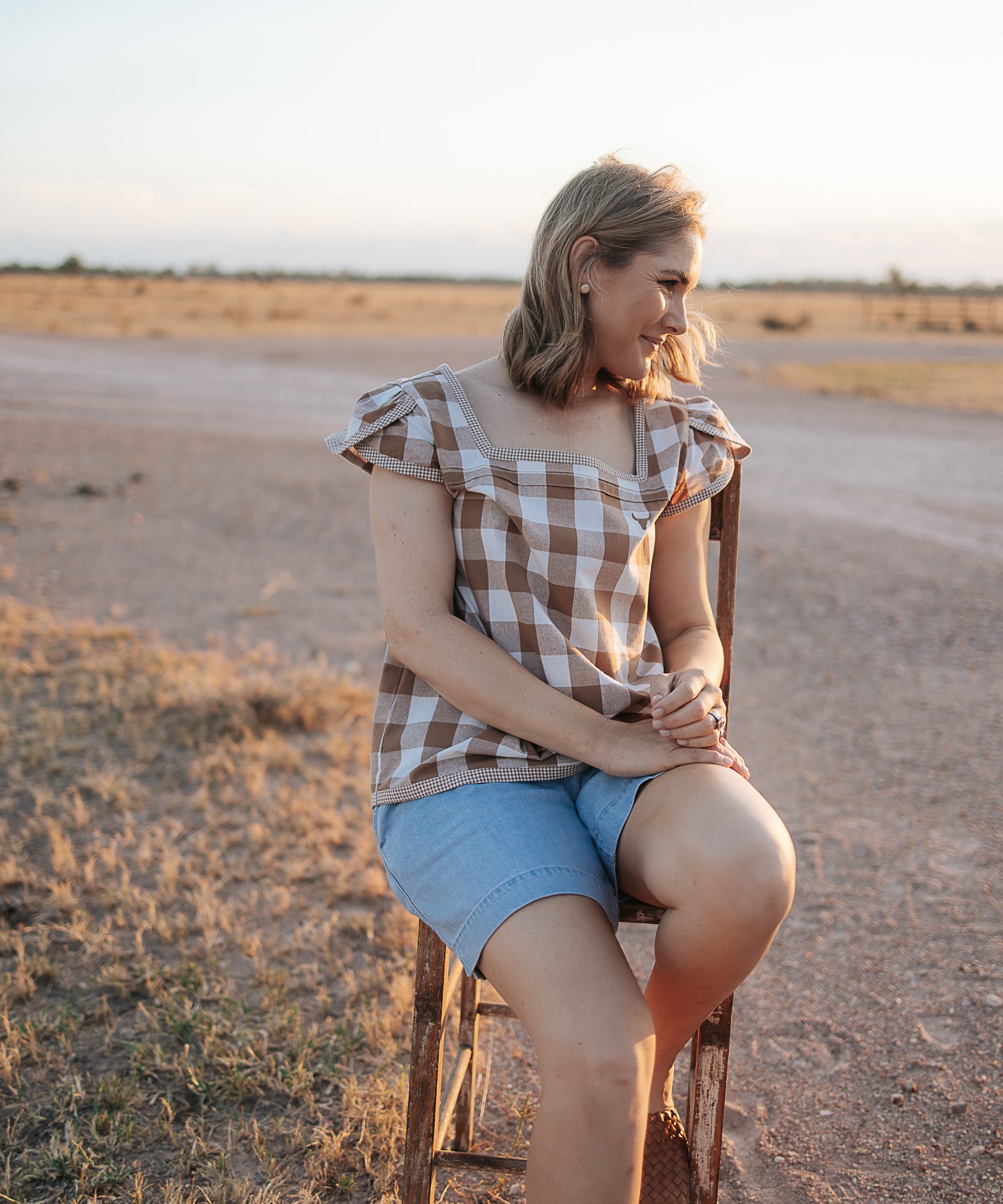 Dusty gingham women's blouse back view showing relaxed women's fit in dusty gingham check