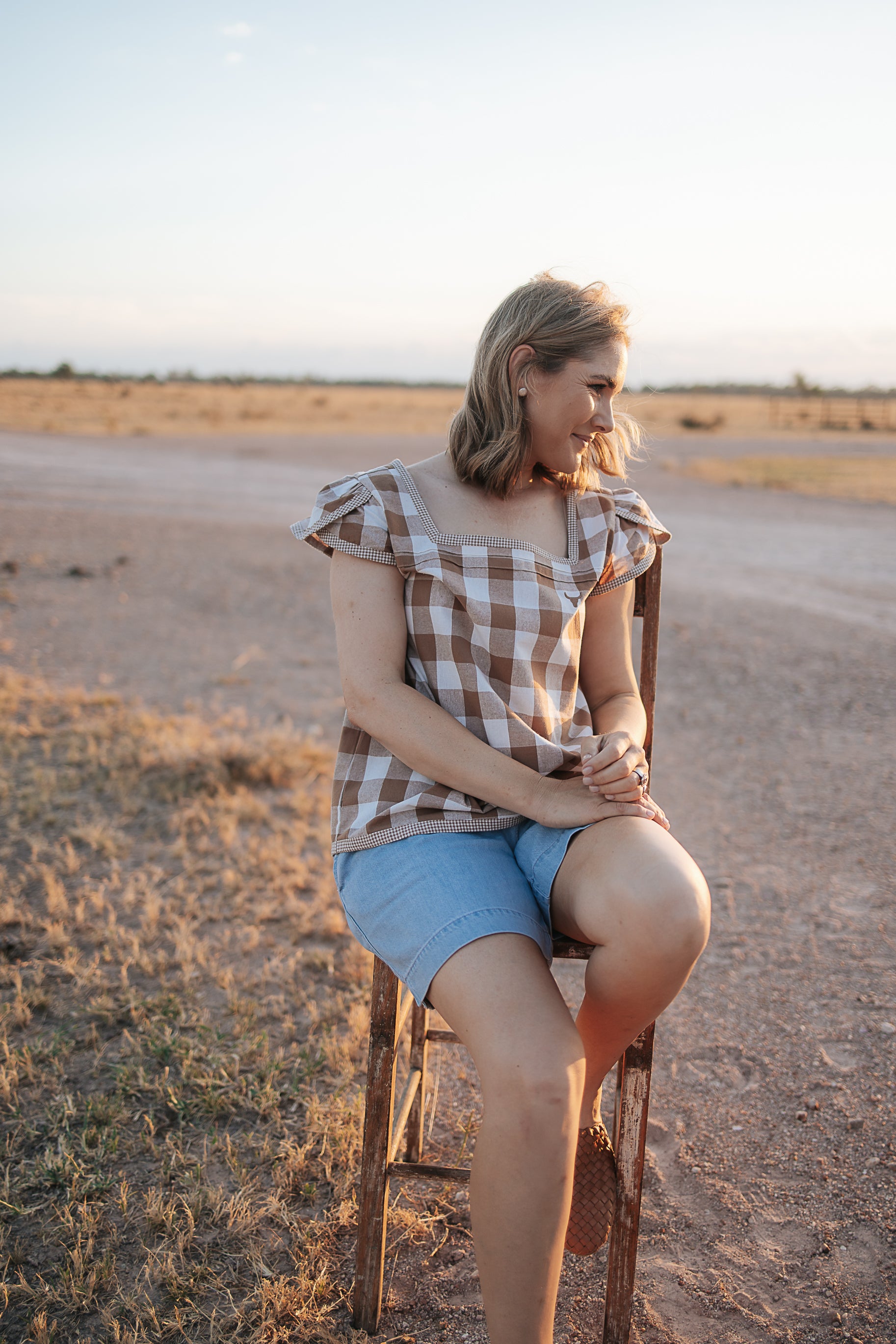 Dusty gingham women's blouse back view showing relaxed women's fit in dusty gingham check