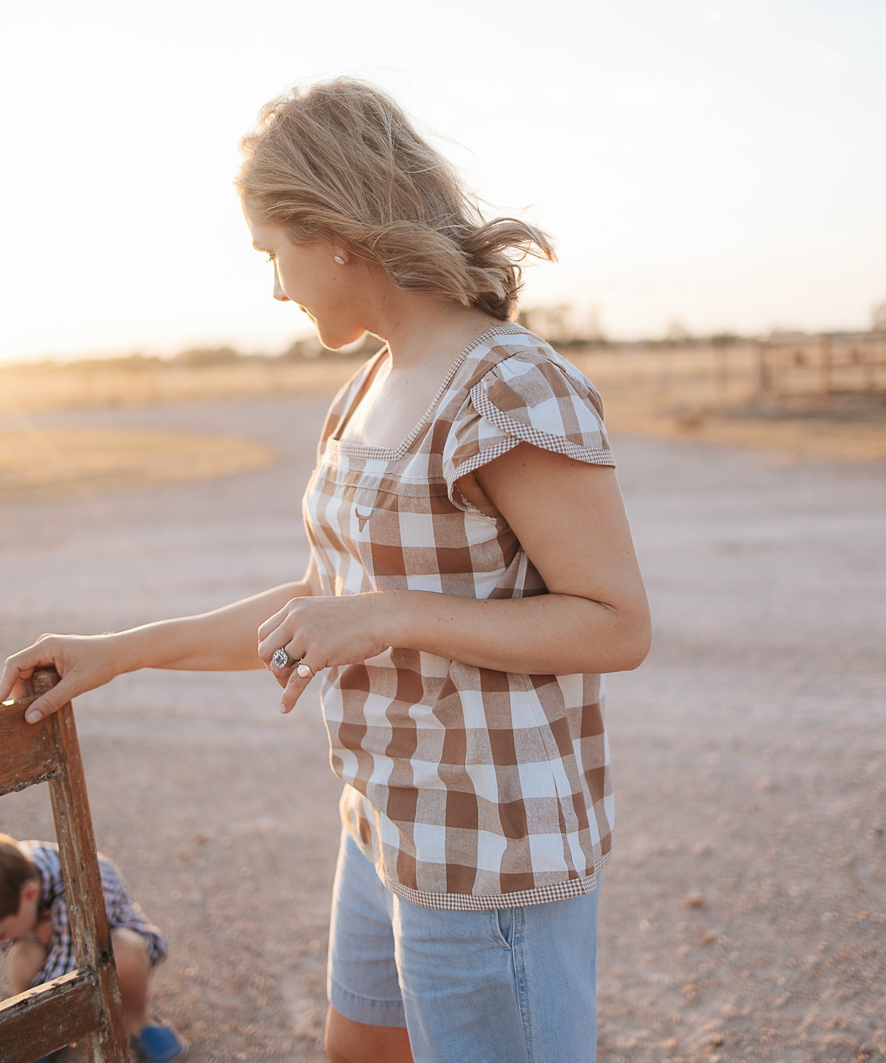 Dusty gingham women's blouse worn showing charming country casual women's look in dusty gingham