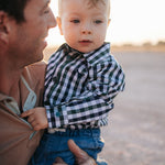 Cody green and navy gingham long sleeve romper print close-up showing green and navy gingham check