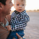 Cody green and navy gingham long sleeve romper print close-up showing green and navy gingham check