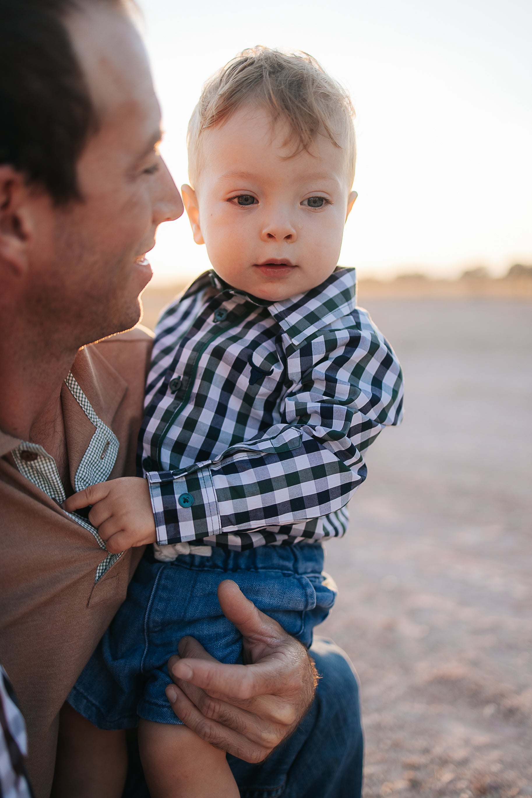 Cody green and navy gingham long sleeve romper print close-up showing green and navy gingham check