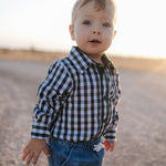 Cody green and navy gingham long sleeve romper back view showing snap closure and gingham check