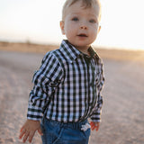 Cody green and navy gingham long sleeve romper back view showing snap closure and gingham check