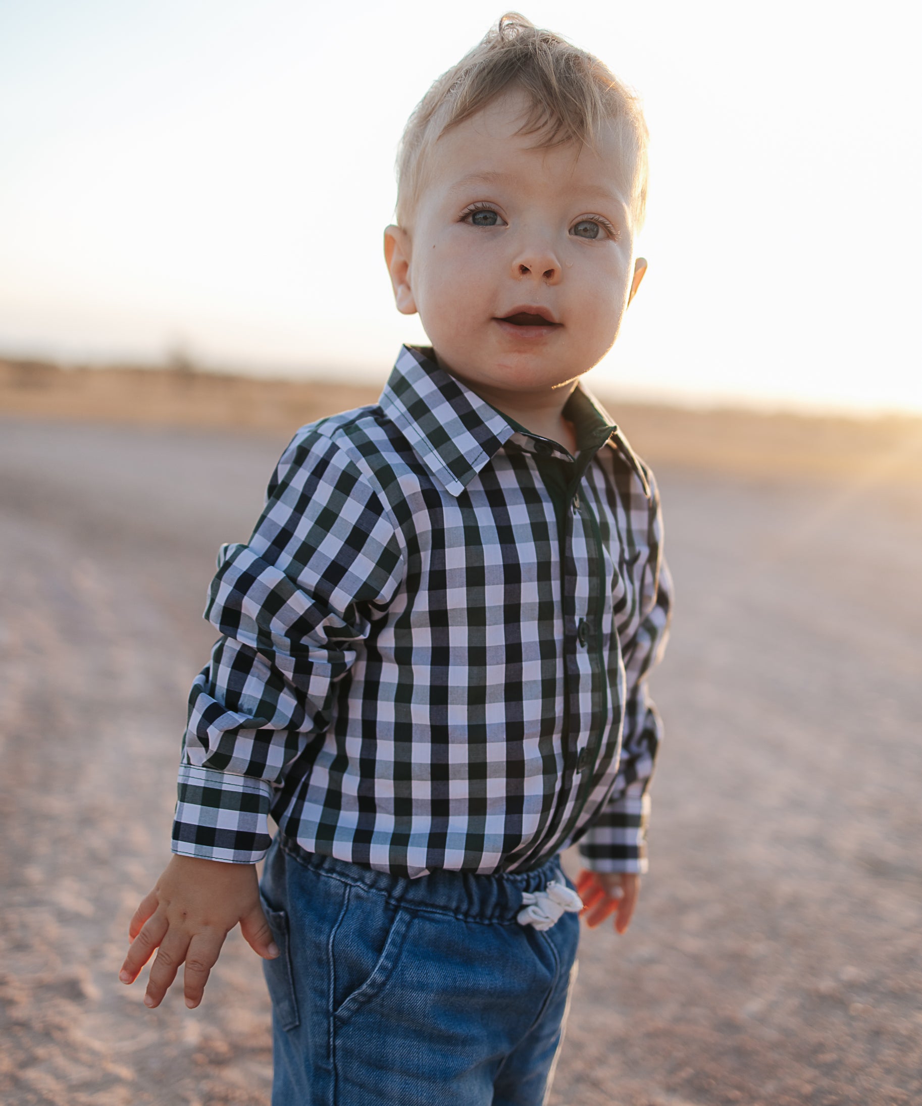 Cody green and navy gingham long sleeve romper back view showing snap closure and gingham check