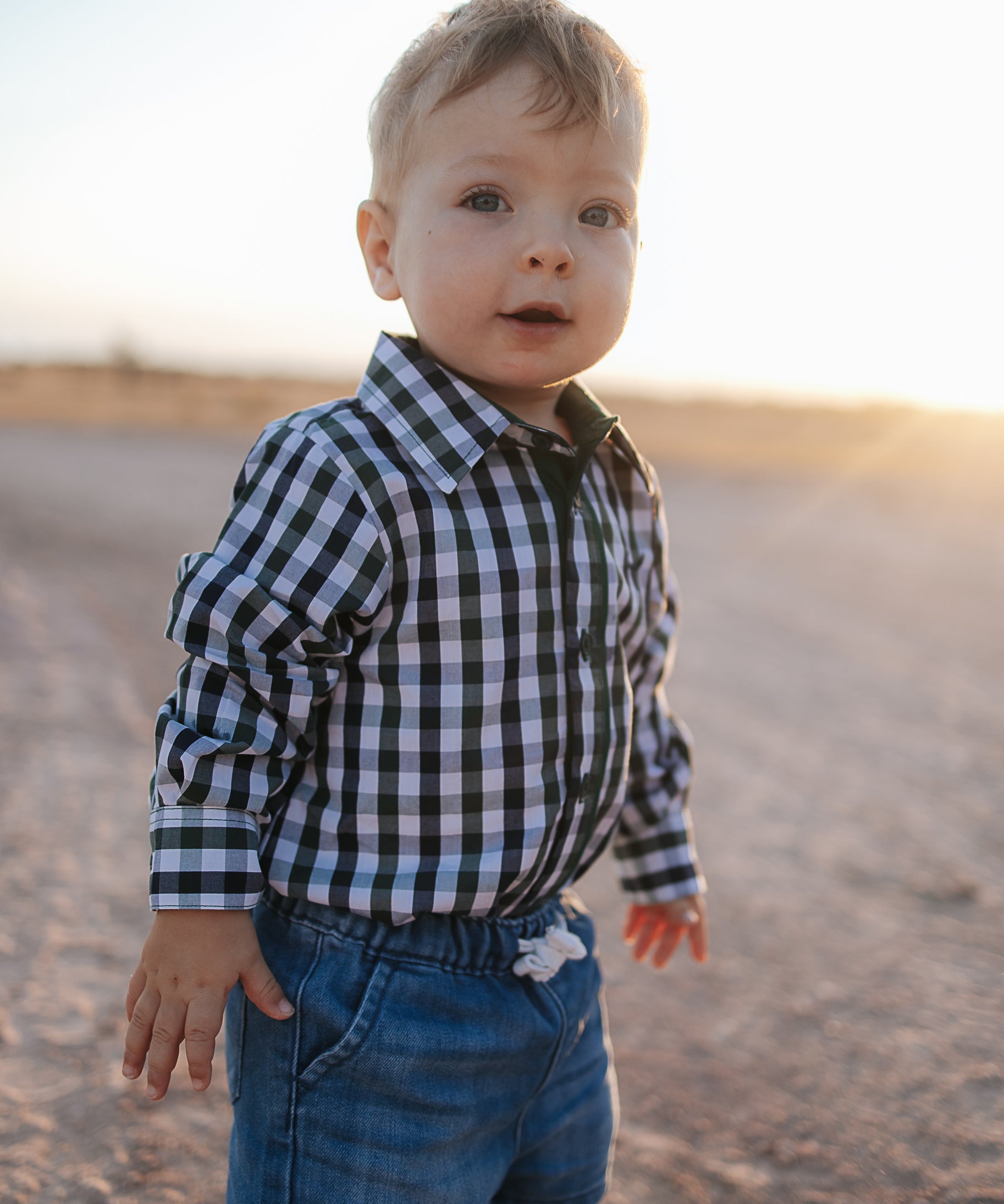 Cody green and navy gingham long sleeve romper front view showing sweet green and navy check romper