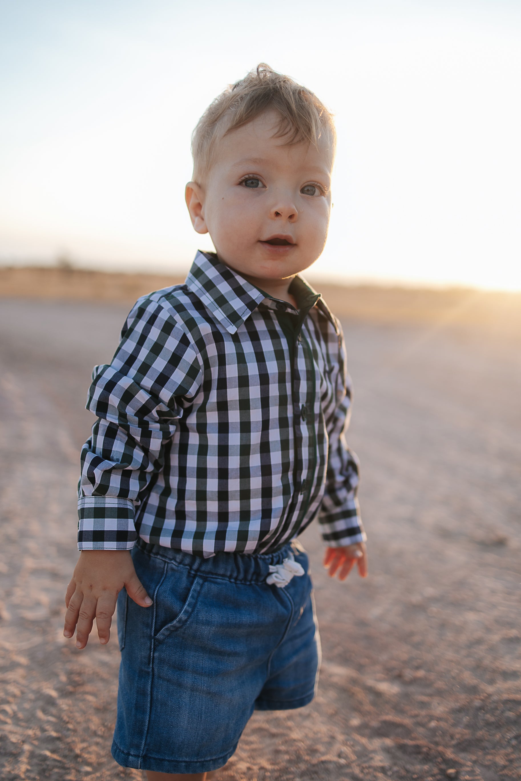 Cody green and navy gingham long sleeve romper front view showing sweet green and navy check romper