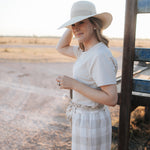 LWCC embroidered ladies tee beige side view showing relaxed women's tee silhouette