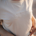 LWCC embroidered ladies tee beige back view showing relaxed women's fit and timeless beige