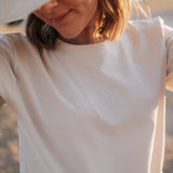 LWCC embroidered ladies tee beige front view showing signature LWCC embroidered logo on classic beige