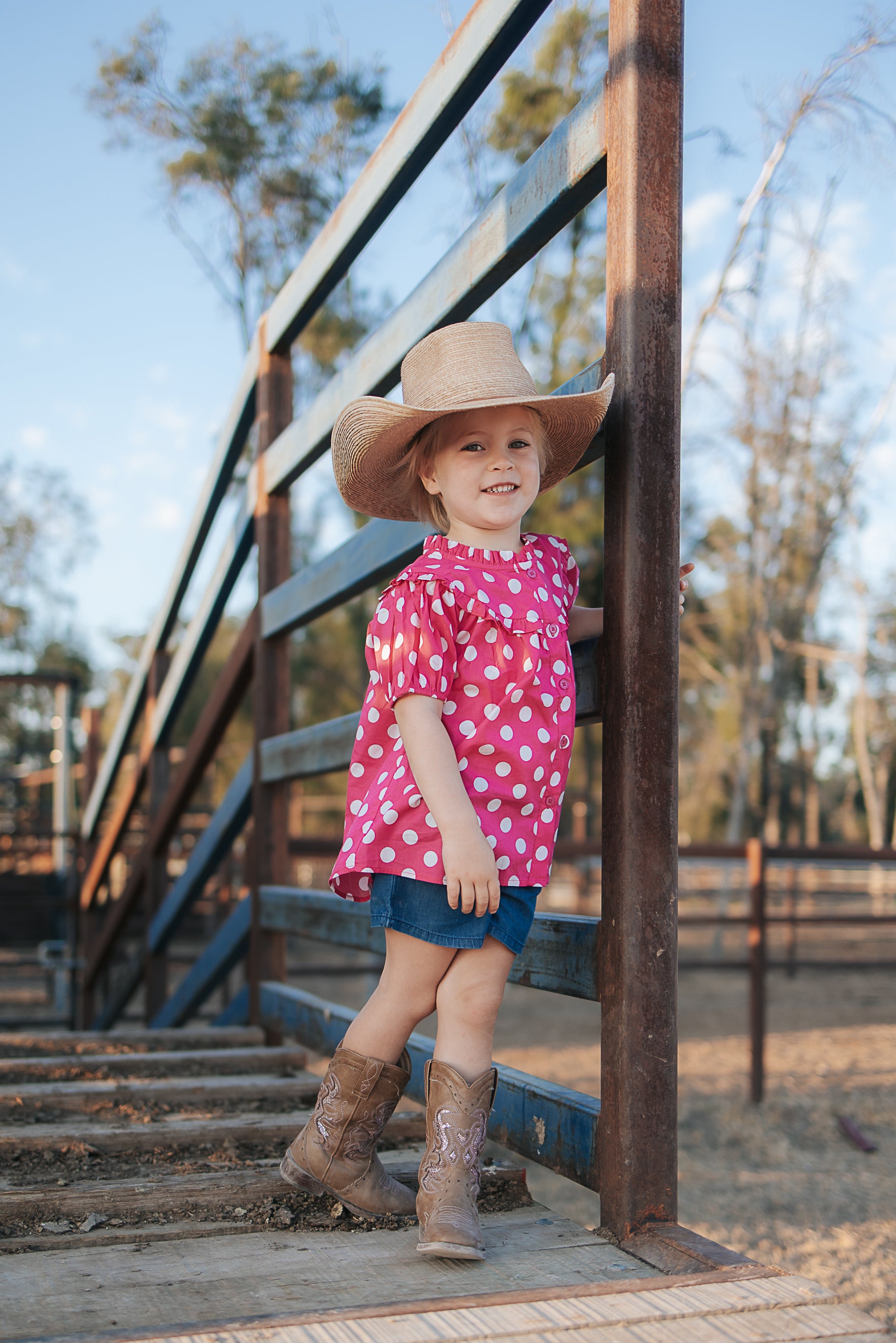 Kansas polkadot pink short sleeve blouse print close-up showing fun pink polkadot pattern
