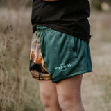 Moss green men's footy shorts front view showing relaxed fit in fresh moss green