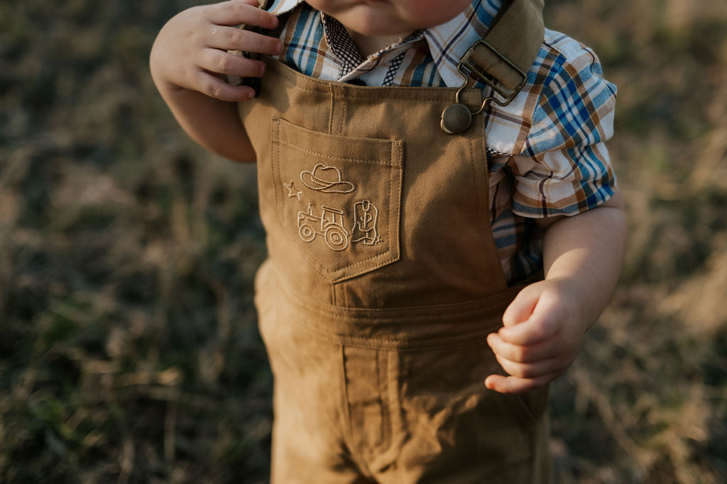 Blaze brown overalls bib pocket detail showing quality denim construction