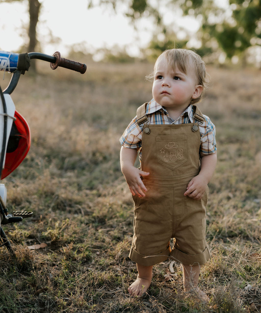 Blaze brown overalls front view showing classic brown denim overalls for kids