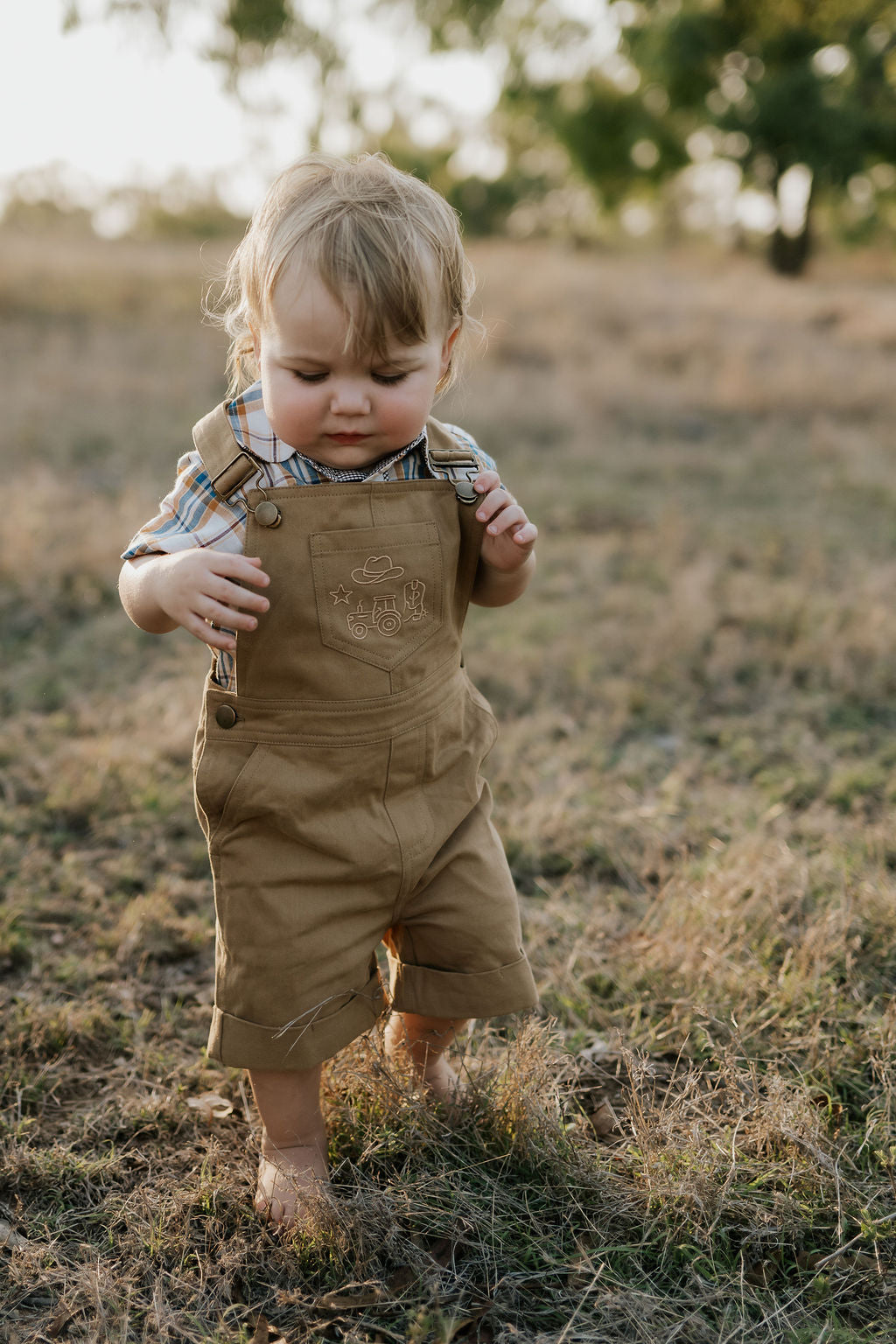Blaze brown overalls flatlay showing full overalls design in rich brown denim