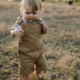 Blaze brown overalls flatlay showing full overalls design in rich brown denim