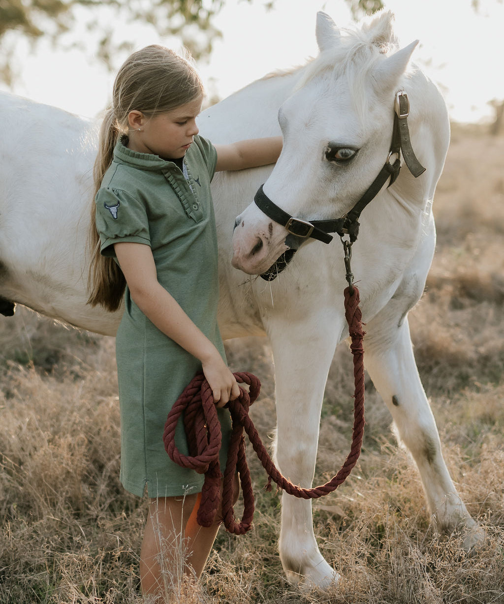 Kathy girls khaki polo dress worn by girl showing polished country casual girls style