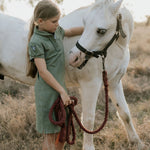 Kathy girls khaki polo dress worn by girl showing polished country casual girls style