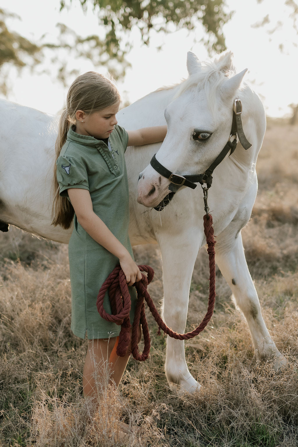 Kathy girls khaki polo dress worn by girl showing polished country casual girls style