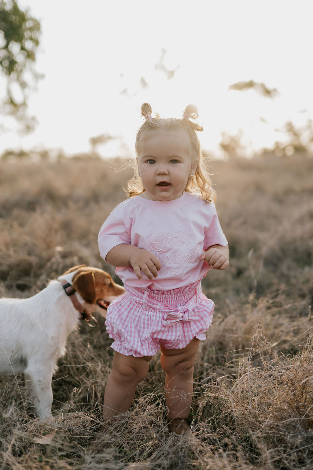 Rhiannon pink gingham baby bloomers worn by baby showing adorable pink gingham country style