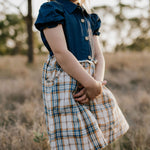 Georgia dark denim check swing dress flatlay showing full A-line swing design in dark denim check