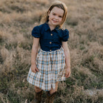 Georgia dark denim check swing dress front view showing charming dark denim check girls swing dress