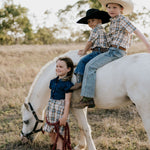 Austin checked tan short sleeve shirt back view showing relaxed boys fit in tan check fabric