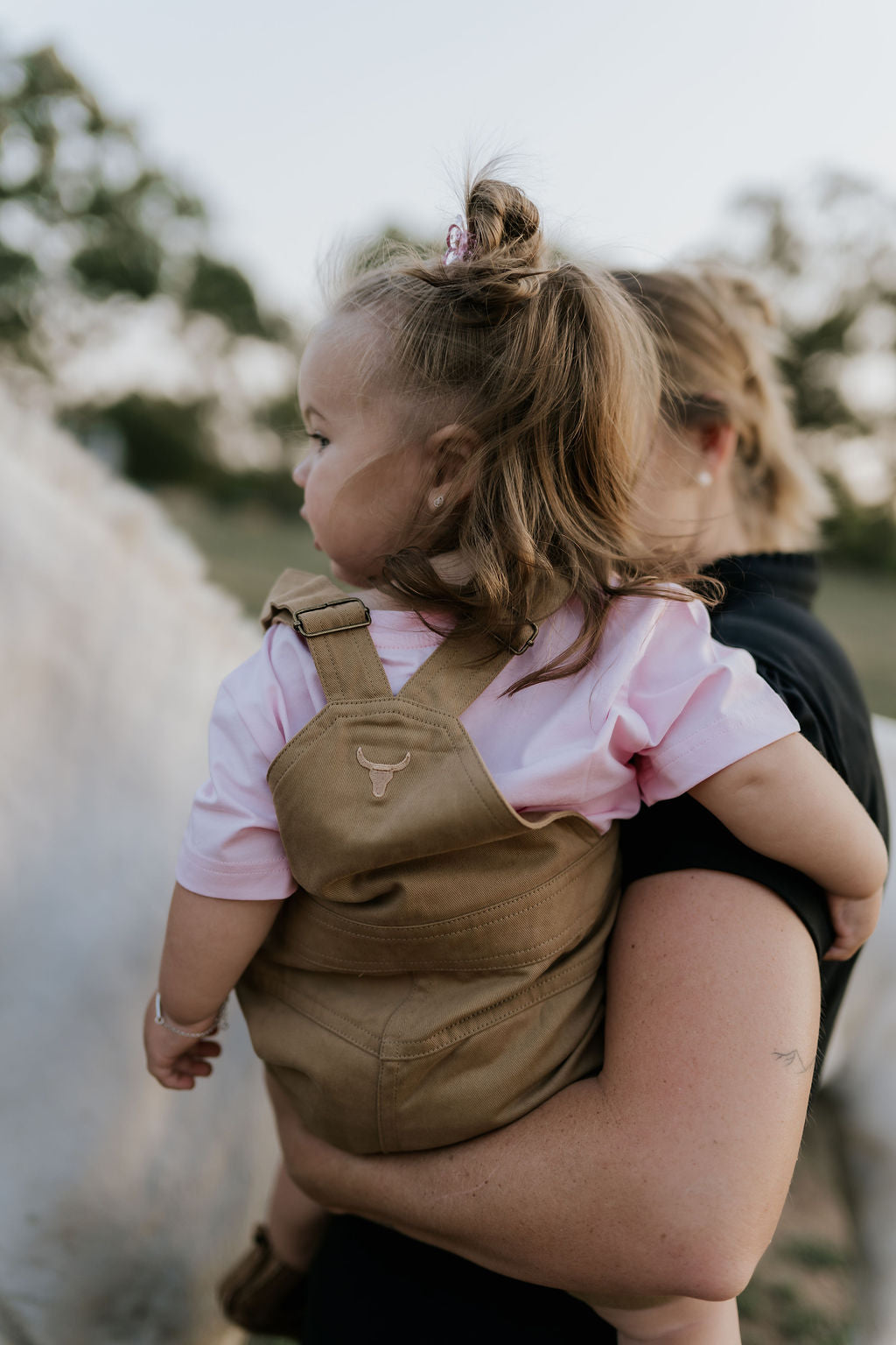 Blaze brown overalls worn by child showing adorable western country style