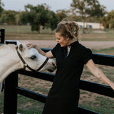 Shay semi-fitted women's black polo dress collar detail showing classic polo neckline in black