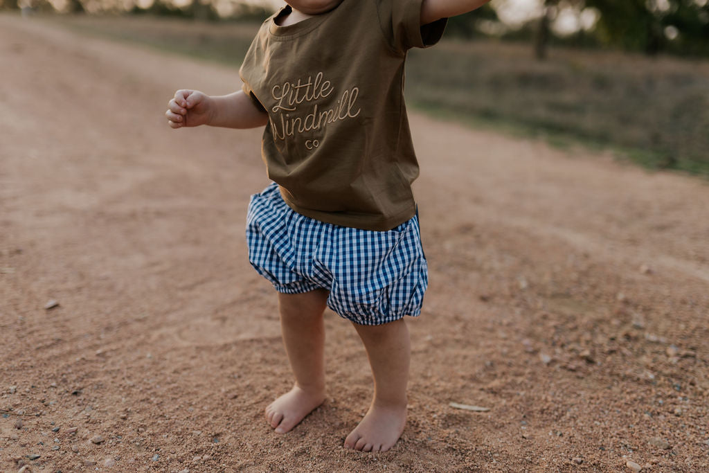 Charlie navy gingham baby bloomers flatlay showing full classic navy check pattern