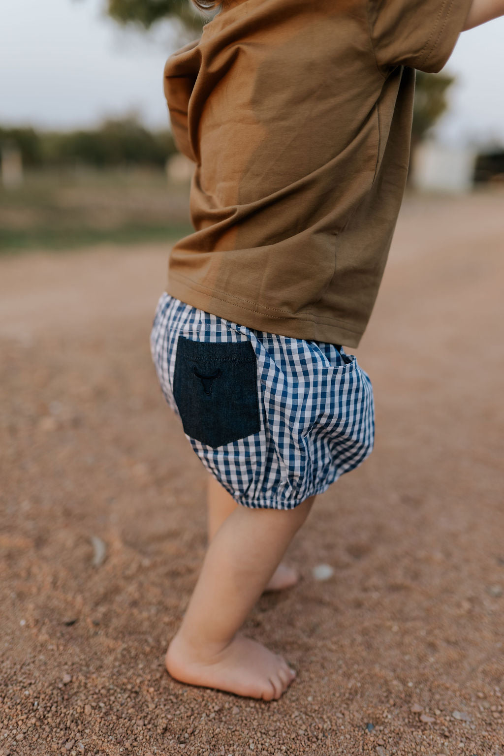 Charlie navy gingham baby bloomers fabric close-up showing quality navy gingham check weave