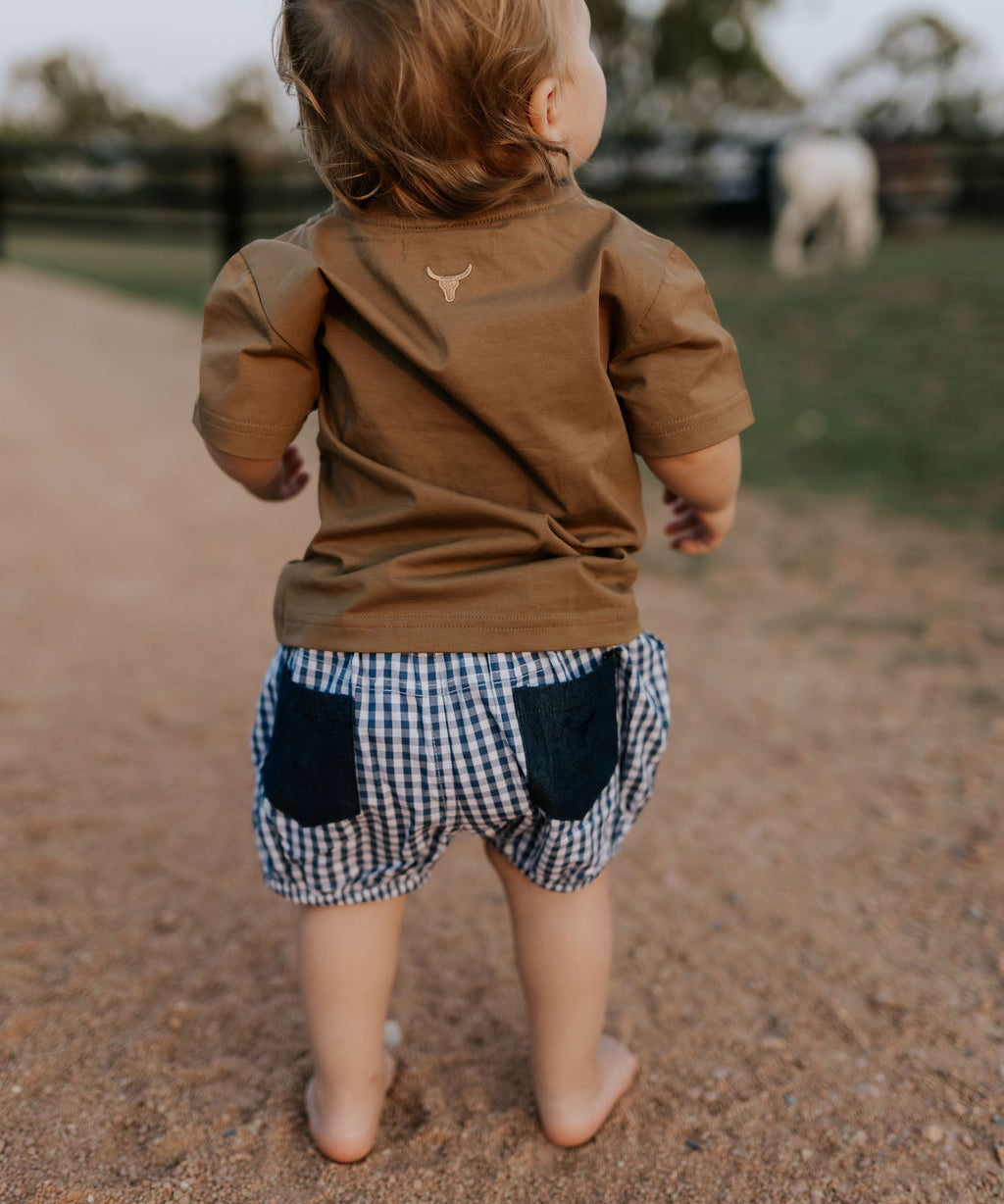 Charlie navy gingham baby bloomers back view showing neat navy check style and comfortable nappy-friendly fit