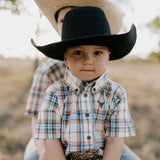 Austin checked tan short sleeve shirt flatlay showing full button-up shirt design in tan check