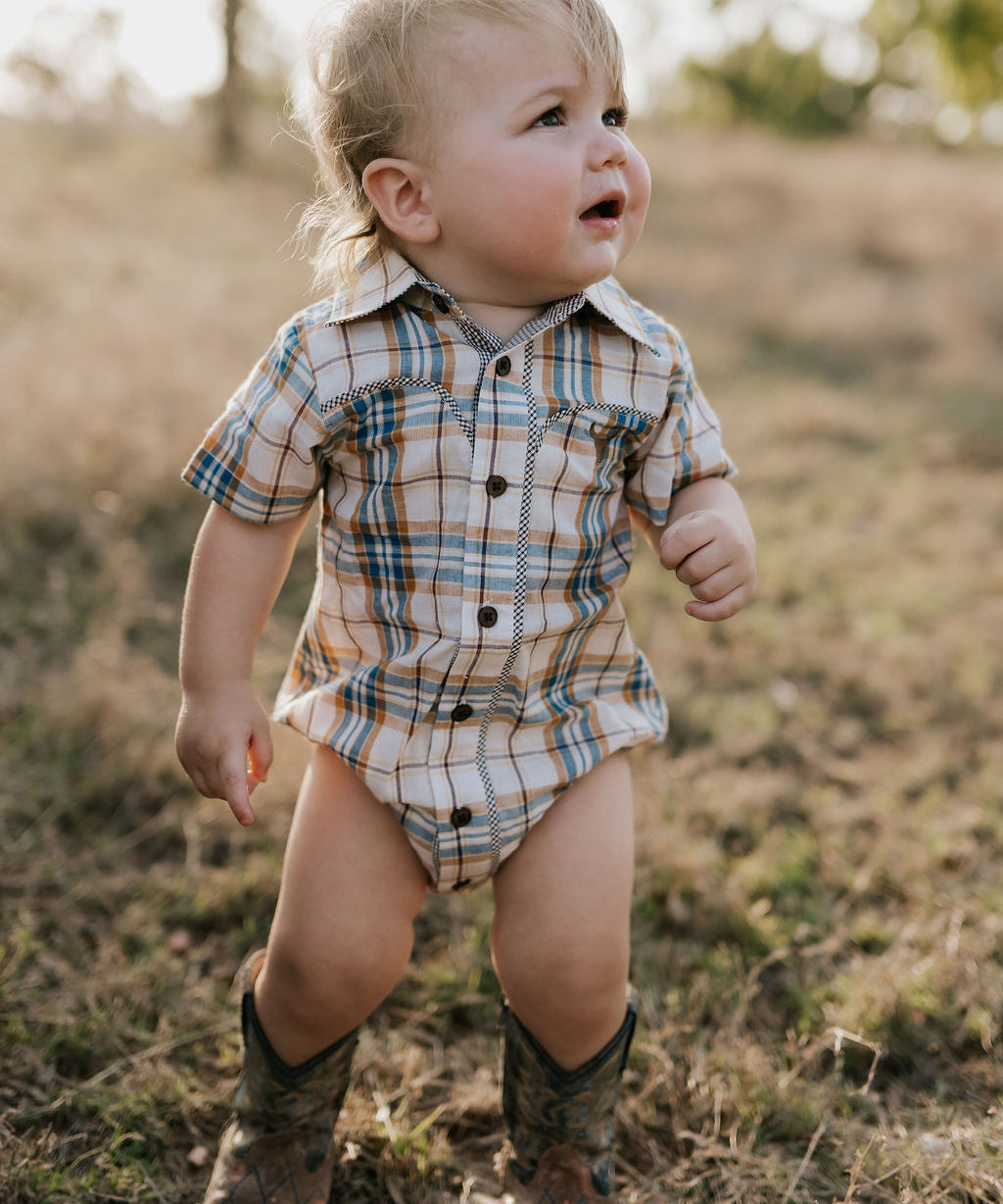 Dallas checked tan short sleeve romper front view showing classic tan check romper for toddlers