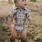 Dallas checked tan short sleeve romper front view showing classic tan check romper for toddlers