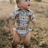 Dallas checked tan short sleeve romper front view showing classic tan check romper for toddlers
