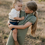 Kathy girls khaki polo dress front view showing smart khaki polo neck dress for girls