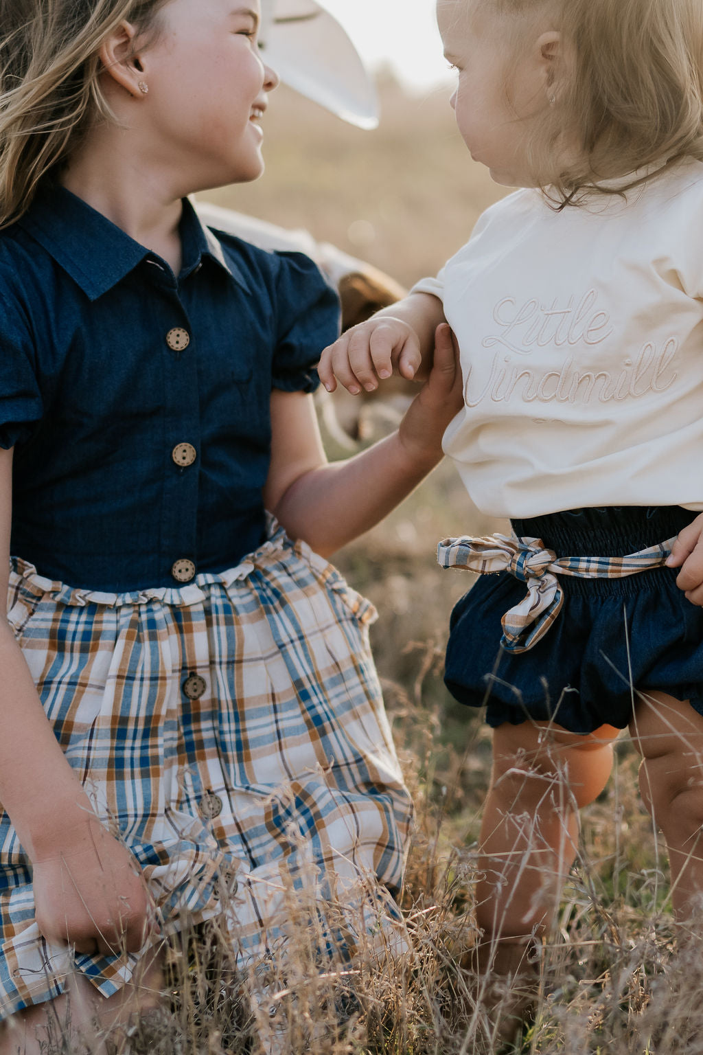 Monica denim baby bloomers with check tie back view showing cute denim style and comfortable fit