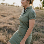Katherine semi-fitted women's khaki polo dress flatlay showing full dress design in elegant khaki
